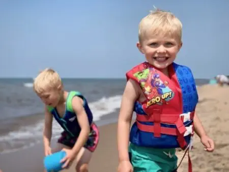 Families enjoying the Lake Superior beach
